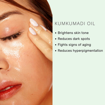 Close-up of a person applying Kumkumadi oil to their face with text highlighting its benefits.