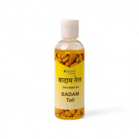 Bottle of Ashtang Herbals Badam Tail (Almond Oil) on a white background