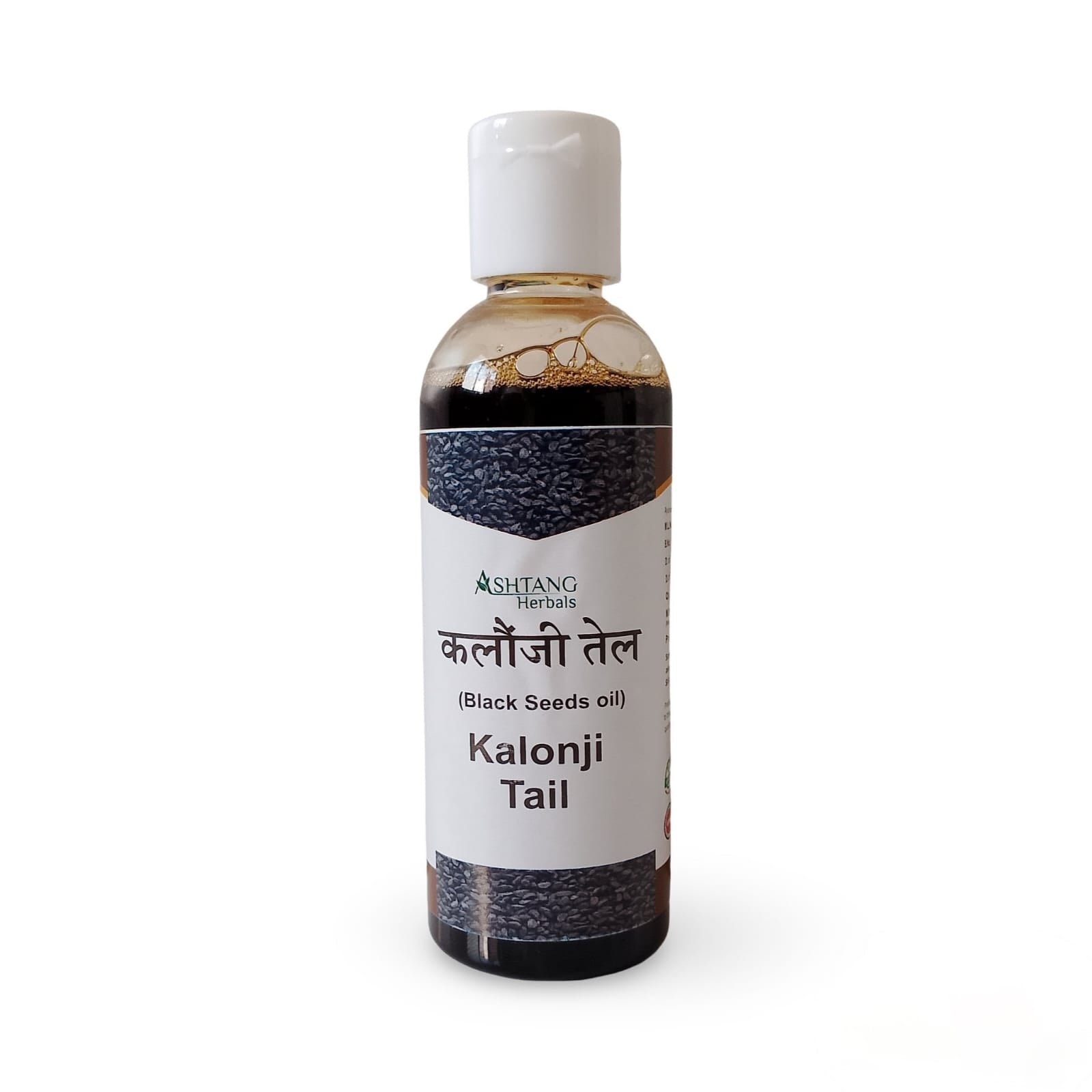 Bottle of Kalonji Tail oil with a white label on a white background
